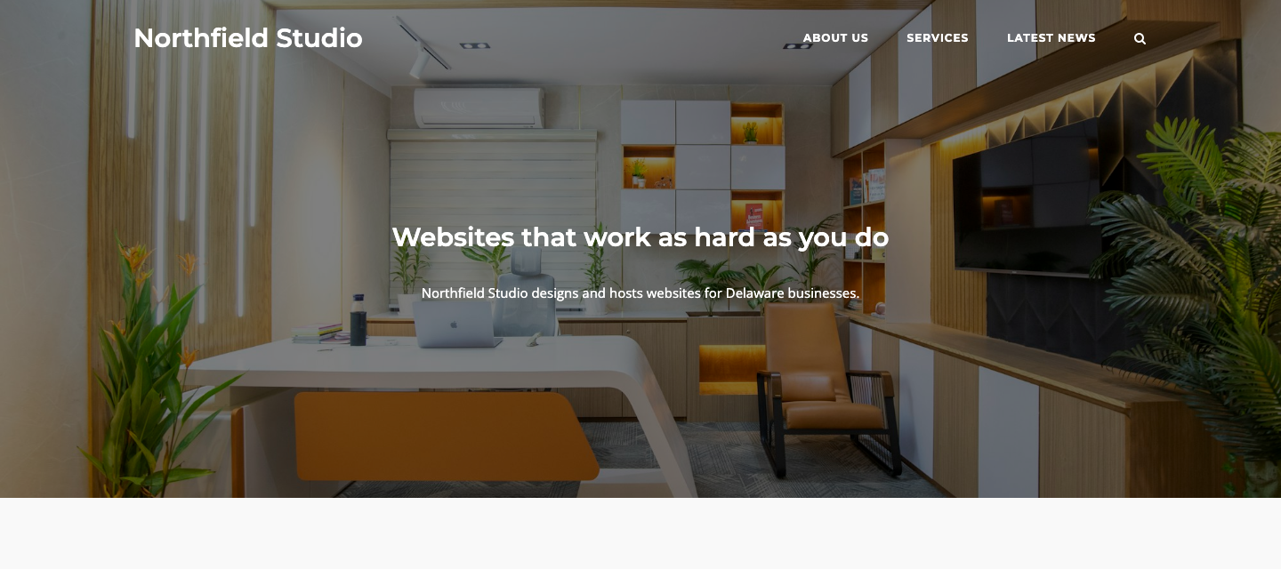 A page with Header Overlap turned on: the site title and menu sit in light text over a full width image